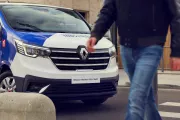 Trafic e-tech park in the street and someone is walking on a crosswalk